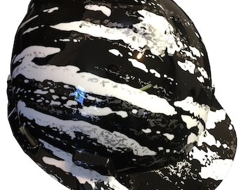 May include: Black hard hat with a white and gray abstract pattern.
