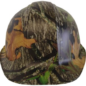 May include: A camouflage hard hat with a brown, green and white pattern. The hat has a wide brim and a smooth surface.