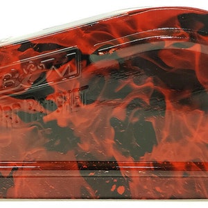 May include: A red and black metal toolbox with a flame pattern. The toolbox has the text "B&M" and "PRO BOX" printed on it.