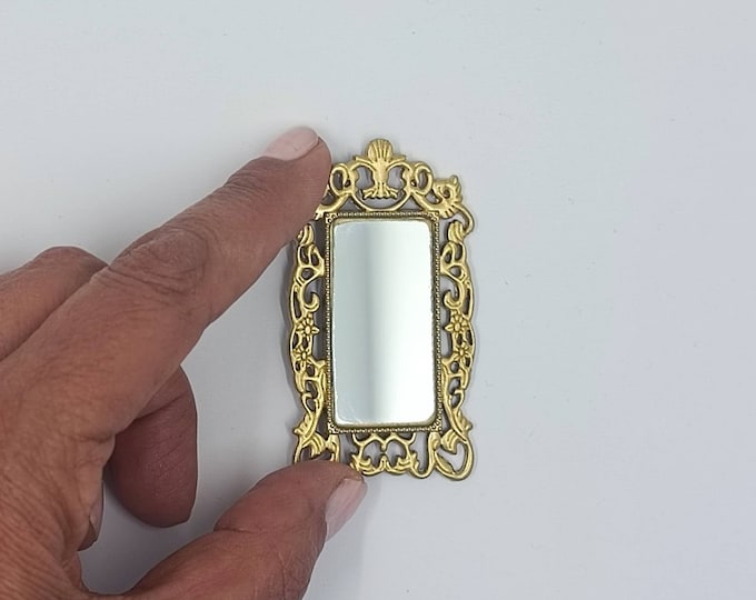 Miniature mirror (I hope glass metal frame)
