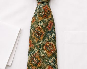 Corbata de seda vintage con estampado geométrico abstracto, color verde azulado y naranja