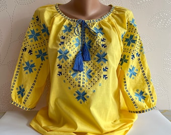 Oekraïne Oekraïens traditioneel geborduurd blouseshirt Vyshyvanka geel blauw katoen