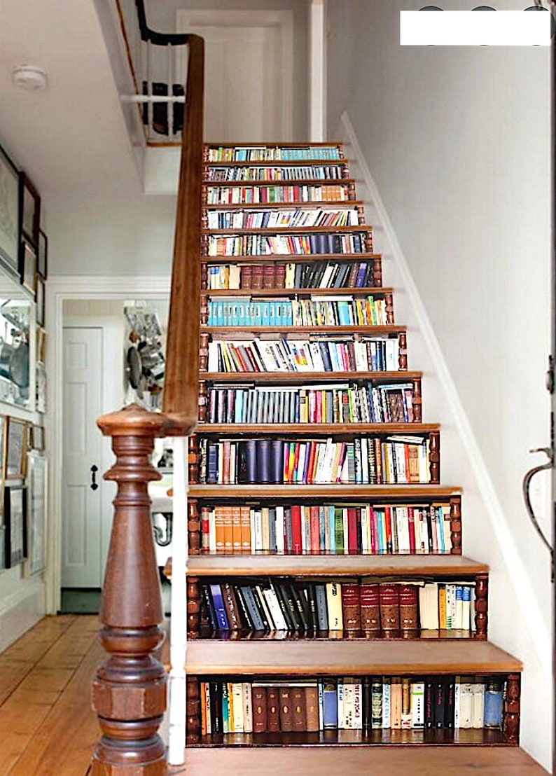 May include: A set of brown wooden stairs with a bookshelf design. The stairs are decorated with a wallpaper of books, creating the illusion of a bookshelf.