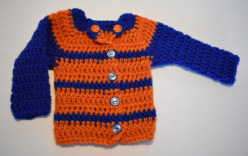 Newborn to 3m Orange and Blue crochet long-sleeve sweater; wbasketball accent buttons