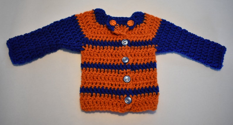 Newborn to 3m Orange and Blue crochet long-sleeve sweater; wbasketball accent buttons