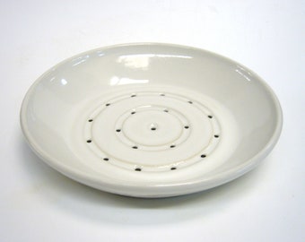 Hand-made flat drain strainer made of stoneware in glossy white glaze, 23.5 x 4.5 cm