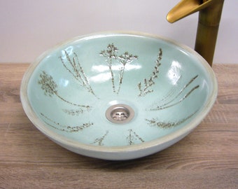 Handmade ceramic basin with patinated prints of meadow flowers