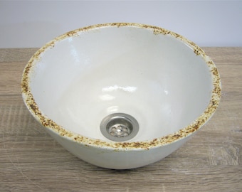 Handmade hand wash basin made of highly fired ceramic in a shiny mint colored glaze