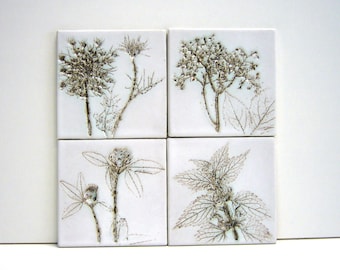 Four ceramics with  prints meadow flowers