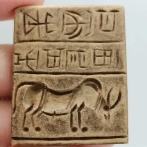 Ancient Near Eastern Tablet Seal Pendant – Bull Motif & Script Carved Stone Amulet Roman