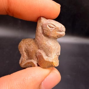 Ancient carved stone lion figurine – hand-carved animal amulet, tribal guardian totem sculpture, rare collectible artifact
