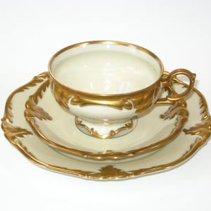 PMR Bavaria Jaeger & Co Ivory and Gold Porcelain Trio: Antique Cup + Saucer with Dessert Plate 3 piece Set