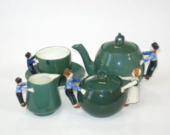 Juego de té infantil de 5 piezas con la marca HAARLEM, figura de niño y niña trepadores holandeses con asa y dedo en el dique, cerámica de Delft vintage
