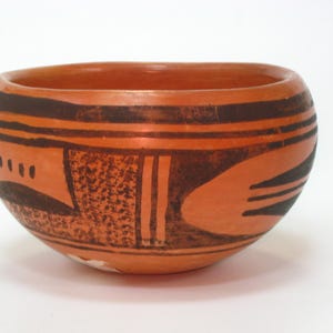 May include: A rustic wooden sign with the text "Welcome to our home" in a handwritten style. The sign features a distressed finish and a simple, inviting design, perfect for a front porch or entryway.