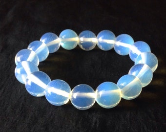 Bracelet en pierre de lune bleu pâle Perles de pierres précieuses rondes naturelles Bracelet extensible pour femmes Bracelet extensible en pierres précieuses Perlé Stretchable Healing Bijoux Bracelet Livraison gratuite