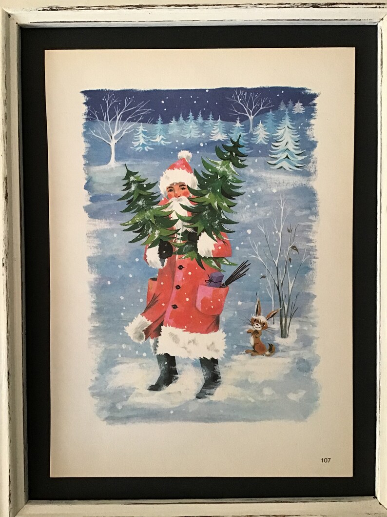 May include: A vintage Christmas illustration of Father Christmas carrying a Christmas tree in a snowy forest. He is wearing a red coat with white fur trim and a red hat. A small rabbit is standing to the right of Father Christmas.