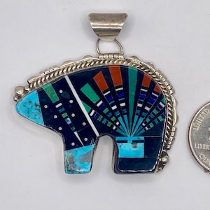 Handmade Navajo Bear Pendant. Inlay with coral, mother of pearl, turquoise, blk onx, multi stone. Looks great with sterling silver beads