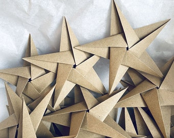 Brown paper origami stars. Recycled kraft paper ornaments. Hand folded decorations. Ethical and plastic free.