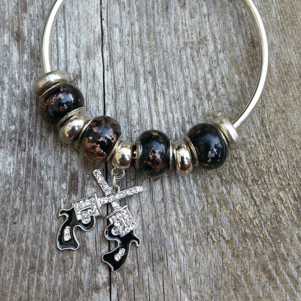 European bead bracelet with black beads and crossed pistols charm .. pistol jewelry .. shooting bracelet .. rhinestone pistols