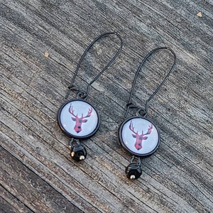 Black dangle earrings with buffaloe check plaid deer silhouette glass cabochon and accent bead . deer earrings .. red and black plaid