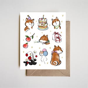 Geburtstagskarte Shiba Inu | Wunderliche Hundeparty Illustration mit Kuchen Ballons Früchten Niedlichen Sumi Ink Art Feiern Erdbeere