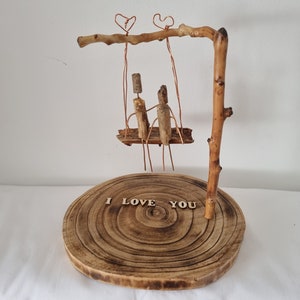 Houten figuren, houtkunst, schommel van liefde, mijn liefde, liefde van mijn leven, schommel,