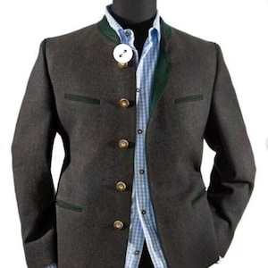 May include: A dark gray blazer with a green velvet collar and four gold buttons. The blazer has two pockets on the front and a white and blue checkered shirt underneath.