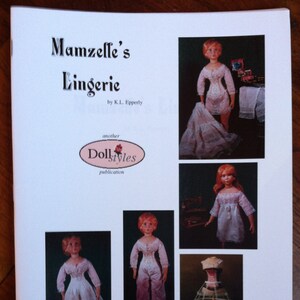 May include: A book cover titled "Mamzelle's Lingerie" by K.L. Epperly, with the Dollstyles publication logo. The cover features several images of dolls in vintage lingerie, including a corset and a crinoline. The dolls have red hair and are posed in various outfits.