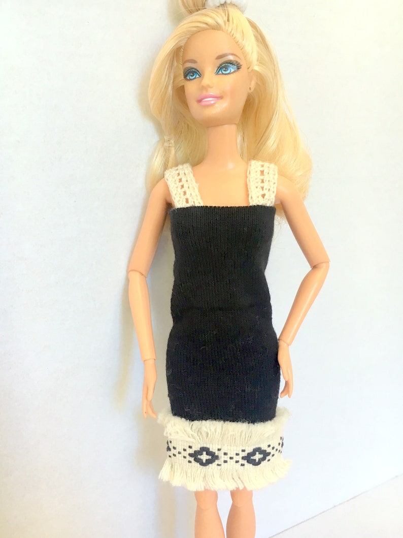 barbie doll in black dress