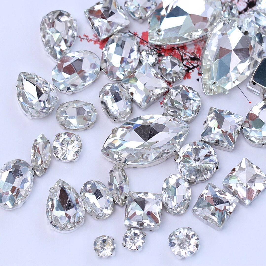 thumbnail interactive-video image 1 of 50pcs Round Clear AB/Crystal Faceted Glass Rhinestones – Flat Back Sew On Jewels For Dress, Craft, DIY Clothing 1 of 2