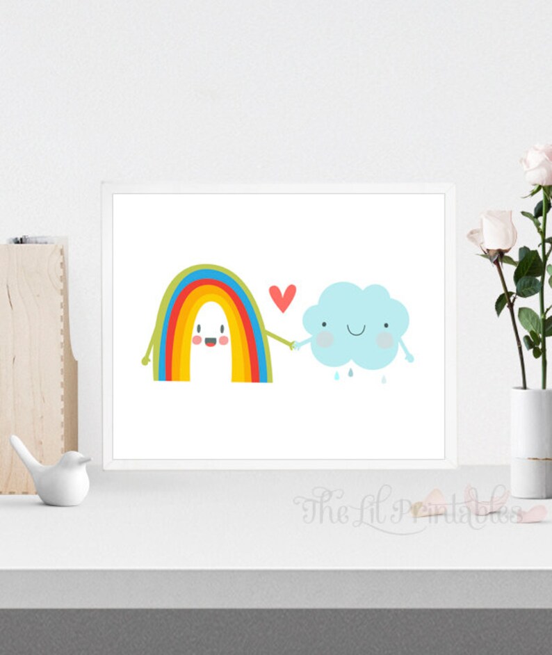 May include: A colorful rainbow with a smiling face holds hands with a blue cloud with a smiling face and a red heart between them. The cloud is raining.