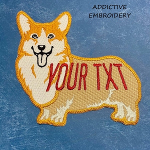 May include: Embroidered patch featuring a smiling corgi dog with the text "YOUR TXT" in red. The patch has a tan body, white face, and orange accents. The text "ADDICTIVE EMBROIDERY" is above the corgi.