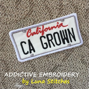 May include: White embroidered patch with a red "California" and black "CA GROWN" text on a white background. The patch is surrounded by a white border.