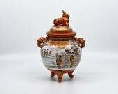 Antique Japanese Kutani porcelain incense burner with fu lion on lid, 8 inches tall, early 1900s