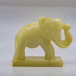 Vintage large and heavy carved stone elephant statue, 7 x 8 inches , mid 20th century