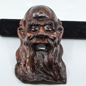 Vintage Chinese carved wooden Shou Lou wall hanging mask ,10 inches long,  1970s