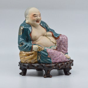 Antique Chinese potcelain , bisque happy Buddha statue on fitted wooden stand, 7 inches tall, 1940s