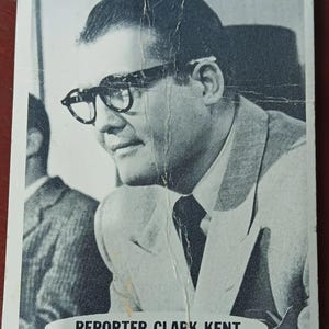 Great addition to your card collection.  1965 Reporter Clark Kent Baseball Card.  Clark Kent Collectible card for your stash!  Great vintage