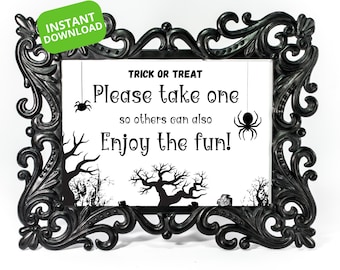 May include: Black and white Halloween sign in a black ornate frame. The sign says "Trick or Treat Please take one so others can also Enjoy the fun!" with a spider graphic on each side.