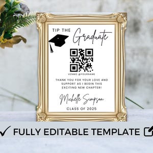 May include: A gold-framed sign with a black and white design. The sign says "Tip the Graduate" and includes a QR code, the text "Venmo @YourName", and the text "Thank you for your love and support as I begin this exciting new chapter! Michelle Simpson Class of 2025".