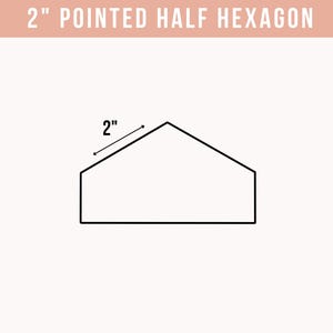 May include: A black line drawing of a pointed half hexagon shape on a white background. The text 2" POINTED HALF HEXAGON is displayed at the top. A dimension line indicates the slanted top edge measures 2 inches in length.