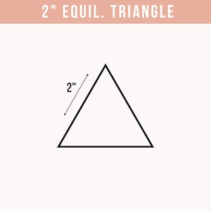 May include: A black outline of an equilateral triangle on a white background. The text 2" EQUIL. TRIANGLE appears at the top. A dimension line along one side indicates a length of 2 inches, confirming the size of the geometric shape.