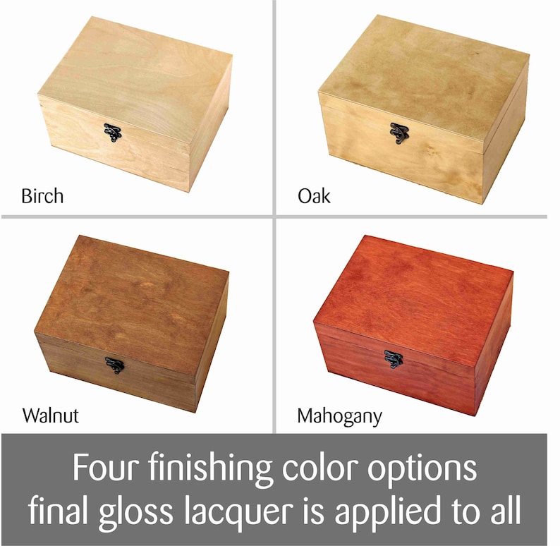 May include: Four wooden boxes in different wood finishes: birch, oak, walnut, and mahogany. Each box has a hinged lid and a black metal latch.  "Four finishing colour options final gloss lacquer is applied to all" text is at the bottom of the image.