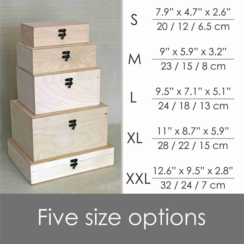May include: Five wooden boxes stacked on top of each other, with the smallest box on top. The boxes are all made of light wood and have a natural finish. Each box has a black metal latch on the front. The boxes are labelled with their size: S, M, L, XL, and XXL. The sizes are listed in inches and centimetres. The text "Five size options" is at the bottom of the image.