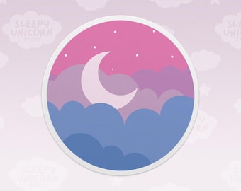 May include: A circular sticker featuring a night sky illustration with a pale crescent moon and small white stars set against a pink, purple, and blue cloud background. The text Sleepy Unicorn Studio is visible in the background pattern.