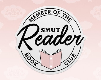 May include: A circular white sticker featuring black text that reads MEMBER OF THE SMUT READER BOOK CLUB. The word Reader is in a large script font, and a small, light pink open book illustration is centered at the bottom of the design.