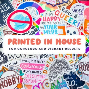 a pile of stickers with the words printed in house