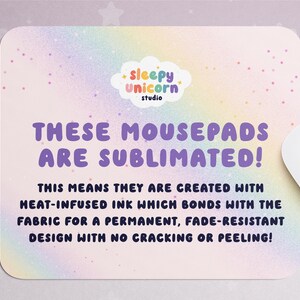 May include: A rectangular mousepad with rounded corners, featuring a pastel rainbow gradient background. The text "THESE MOUSEPADS ARE SUBLIMATED!" is in purple. A white computer mouse is partially visible.