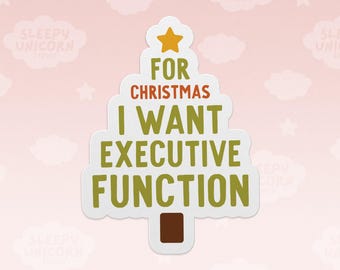 May include: A die-cut sticker shaped like a Christmas tree with a yellow star at the top and a brown trunk at the bottom. The text reads FOR CHRISTMAS in orange and I WANT EXECUTIVE FUNCTION in olive green against a white background.