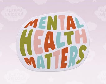 May include: A white oval sticker featuring the text MENTAL HEALTH MATTERS in a bold, rounded, multi-colored font. The letters alternate between shades of orange, light blue, olive green, and soft pink against a plain white background.